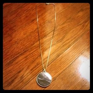 silver necklace with genuine stone pendant